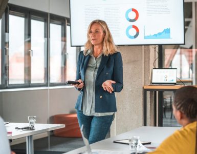 Woman discussing data-driven recruitment in a conference room