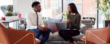 A woman interviewing a man for soft skills