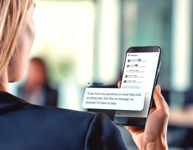 Person holding a smartphone with an AI recruitment chatbot